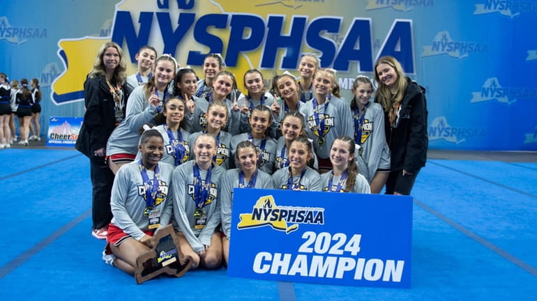 Mount Sinai poses after its victory in the NYSPHSAA cheerleading championship...