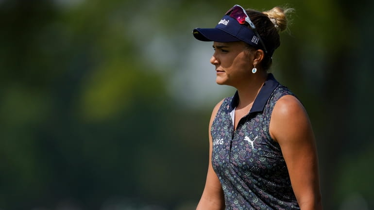 Lexi Thompson walks to the fifth green during the first...