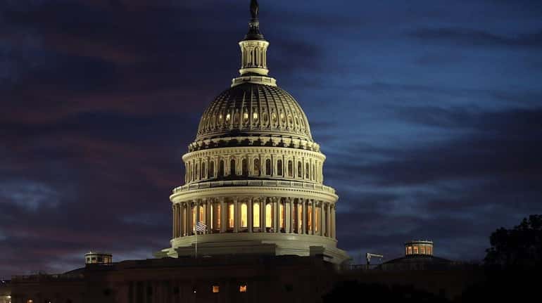The U.S. Capitol as dawn nears, July 25, 2017.