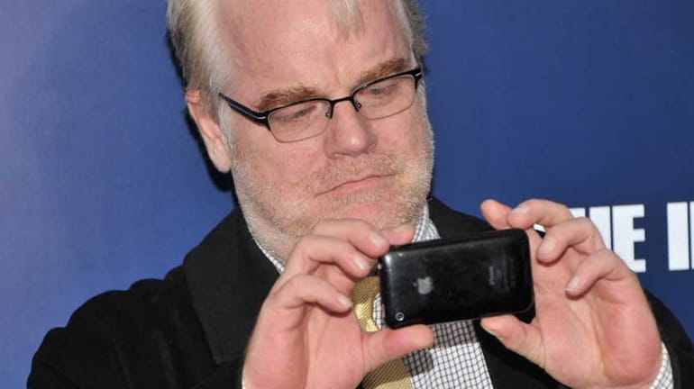Actor Philip Seymour Hoffman attends the premiere of "The Ides...