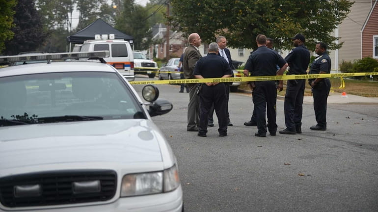Nassau County Police and Hempstead Police investigate a crime scene...