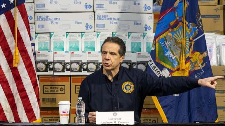 Gov. Andrew M. Cuomo speaks to reporters at the Javits...