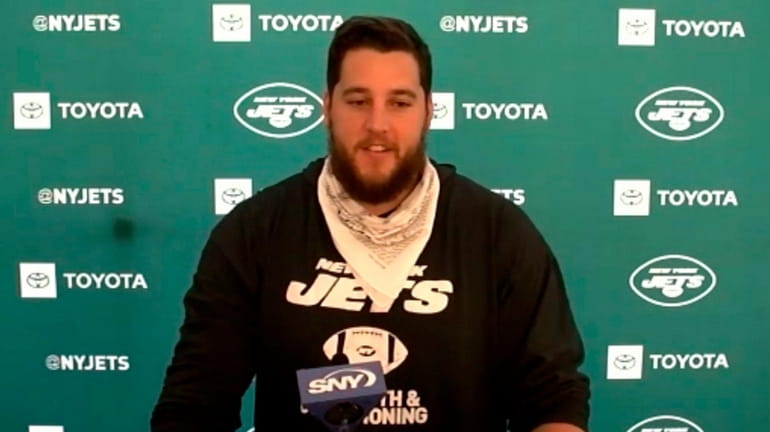 In a video grab from Zoom, Jets guard Greg Van...