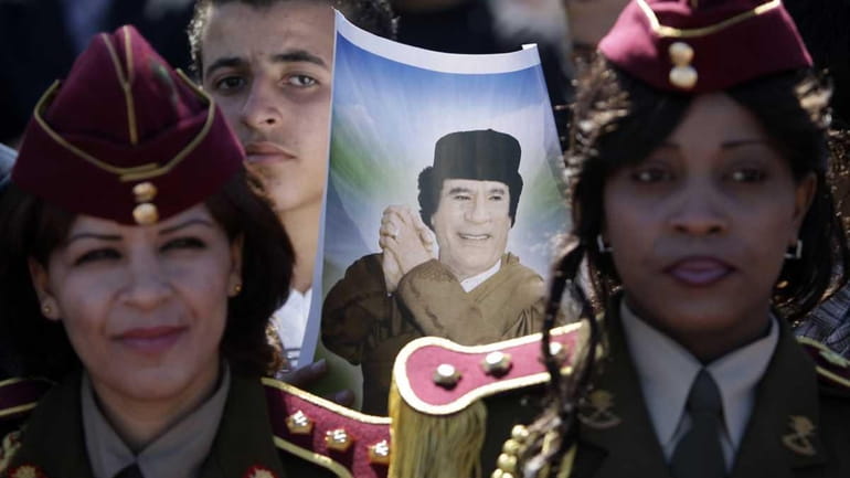 Libyan women army officers Sunday attend the welcome ceremony for...