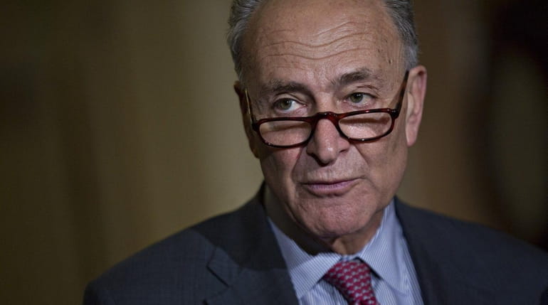 Sen. Charles Schumer (D-N.Y.) speaks to reporters after a Senate...