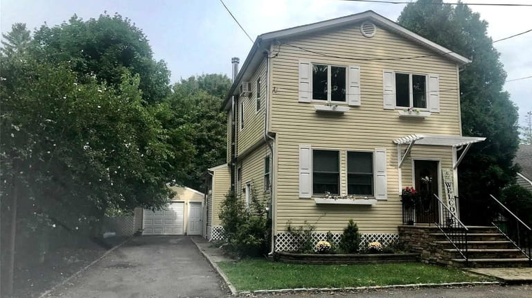 Priced at $399,000, this four-bedroom, two-bathroom Colonial on Rosewell Avenue in Shoreham was...