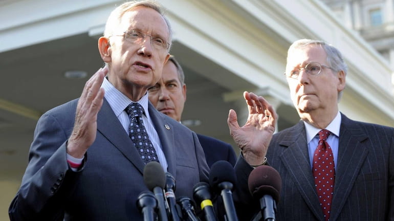 From left, Senate Majority Leader Harry Reid (D-Nev.), House Speaker...