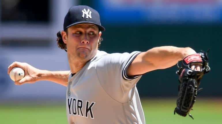 Yankees starting pitcher Gerrit Cole pitches during the first inning of...