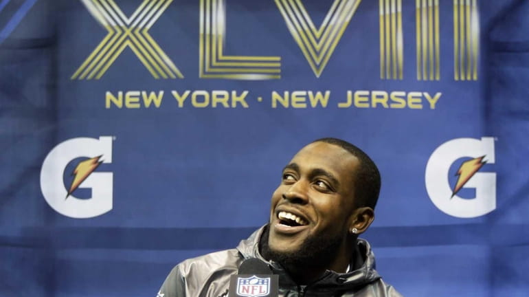 Seattle Seahawks' Kam Chancellor answers a question during media day...