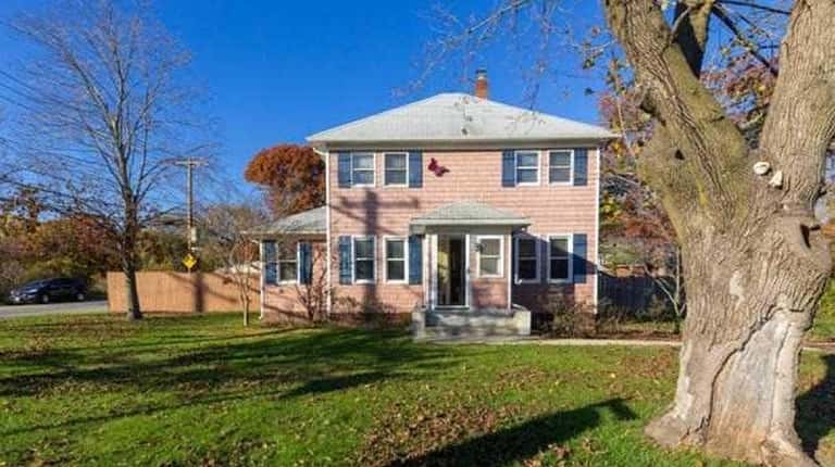 This Lake Ronkonkoma Colonial, for $415,000, includes three bedrooms and...
