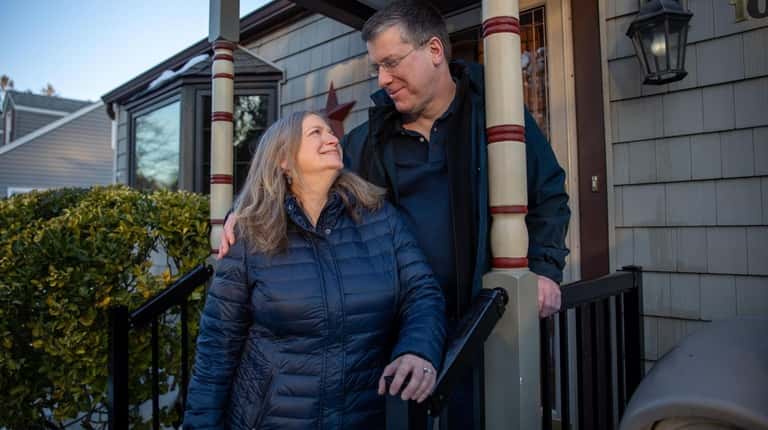 Kirsten Rasmussen and Robert Hanawalt at their home in Northport.