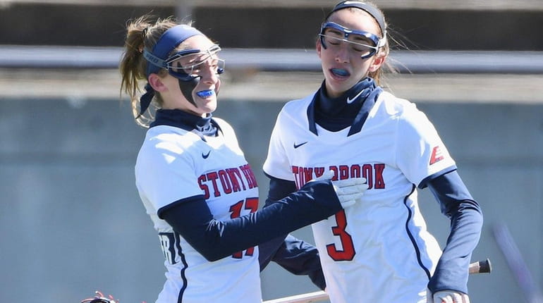 Stony Brook attacker Kylie Ohlmiller, left, celebrates her goal with...