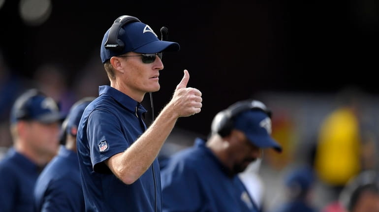 Rams special teams coordinator John Fassel gestures against the Eagles...