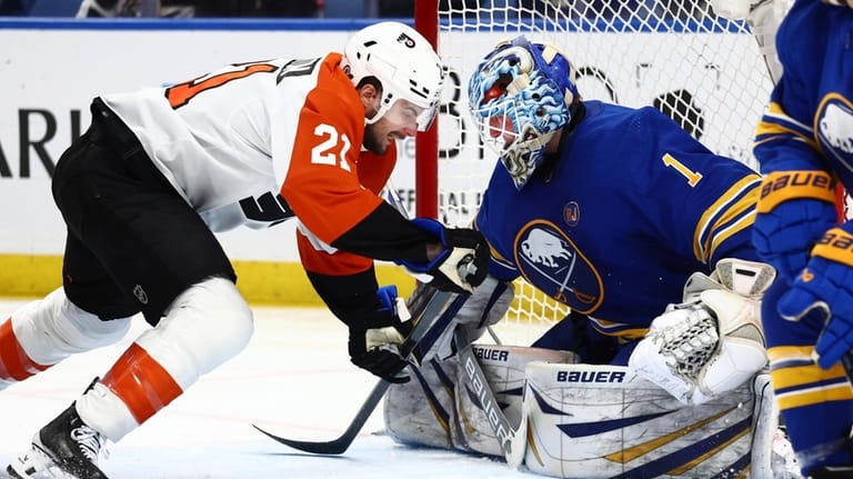 Buffalo Sabres goaltender Ukko-Pekka Luukkonen (1) stops Philadelphia Flyers center...