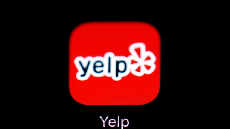 The Yelp app is seen on an iPad in Baltimore...