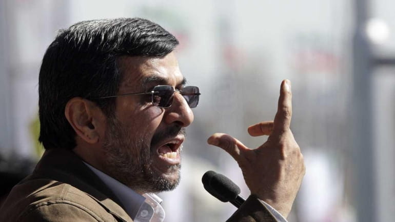 Iranian President Mahmoud Ahmadinejad speaks at a rally to mark...