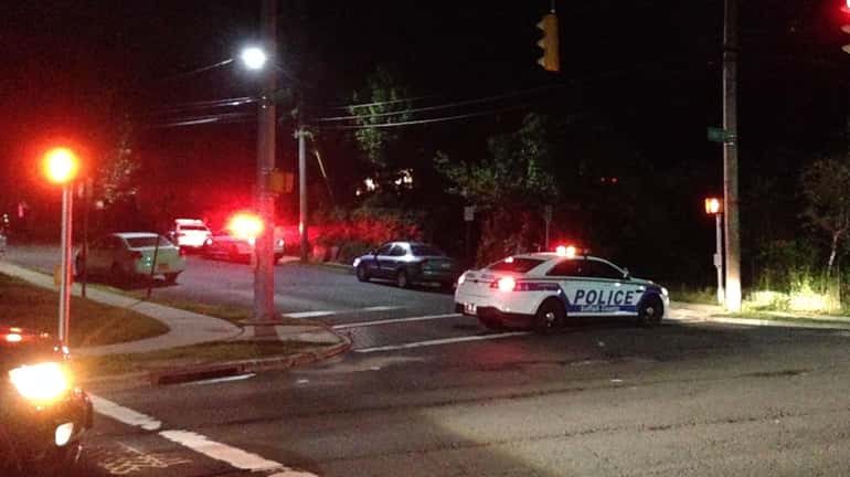 Suffolk police respond to a reported robbery and shooting at...