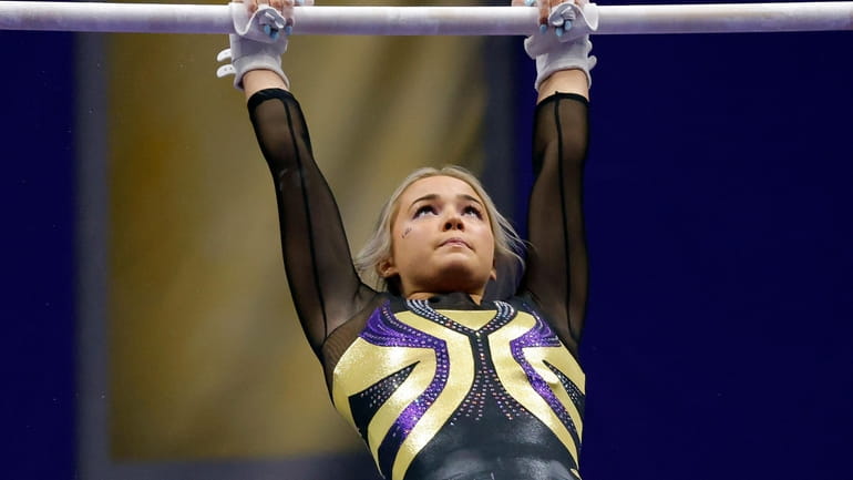 FILE -LSU gymnast Olivia Dunne competes during an NCAA gymnastics...