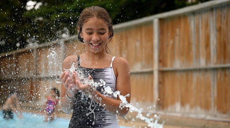 Riley DelGiudice, 10, of Massapequa, enjoys Rath Park Pool in...