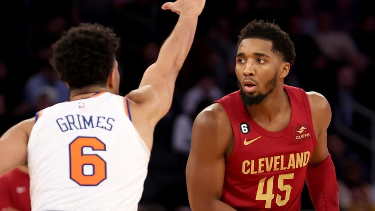 Cleveland Cavaliers guard Donovan Mitchell faces up against New York...