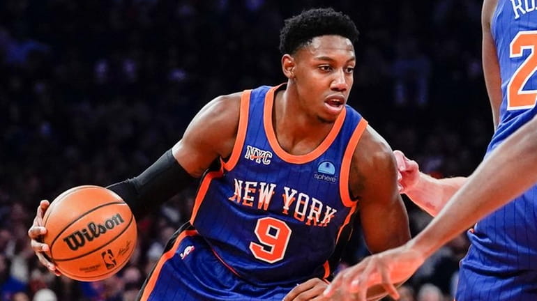 Knicks guard RJ Barrett drives to the basket during the...
