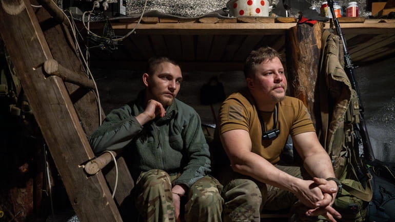 Ukrainian servicemen from the Azov brigade known by call sign...