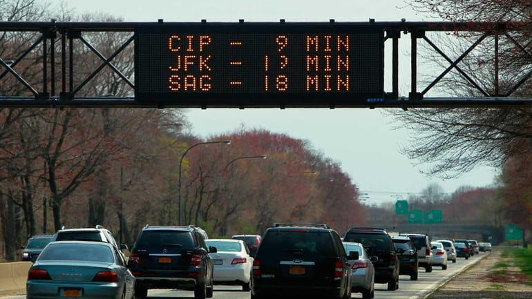 Cars travel southbound on the Meadowbrook Parkway, just north of...