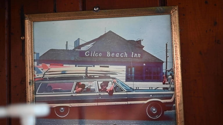 Old photos on the walls trace the Gilgo Beach Inn's...