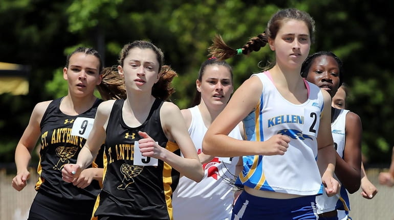 Kellenberg's Maureen Lewin leads all runners into the turn of...