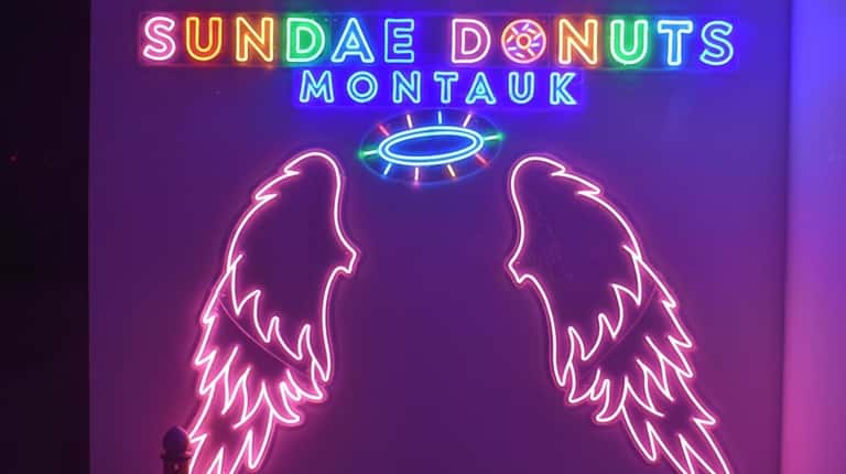 The neon sign advertising Sundae Donuts Montauk.