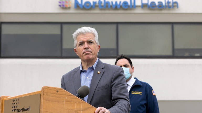 Then-Suffolk County Executive Steve Bellone speaks during a press conference...