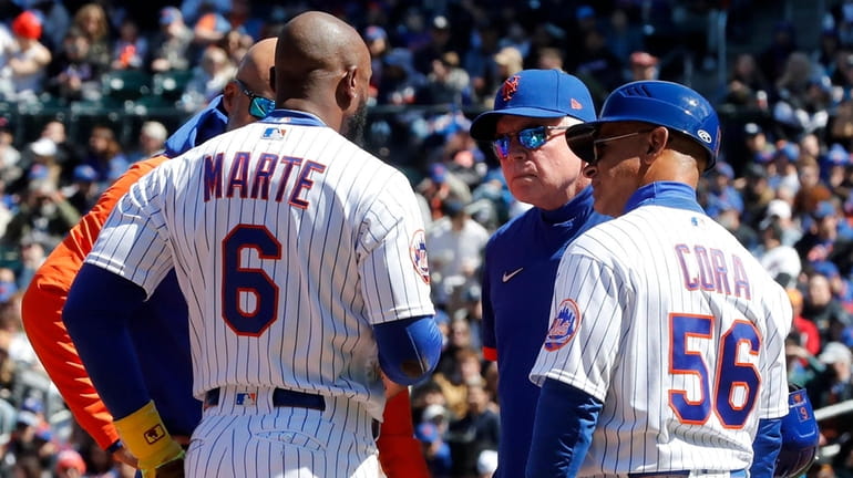 Starling Marte of the Mets is checked out after stealing third base...