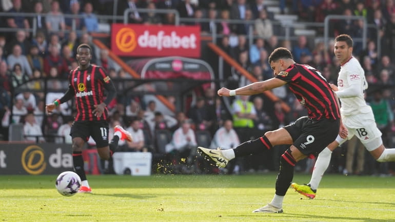 Bournemouth's Dominic Solanke scores his side's opening goal during the...