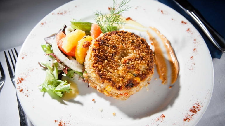 The Maryland crab cake is well-made at Jack Halyards American...