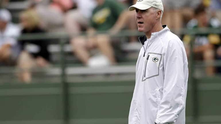 Green Bay Packers general manager Ted Thompson watches training camp...
