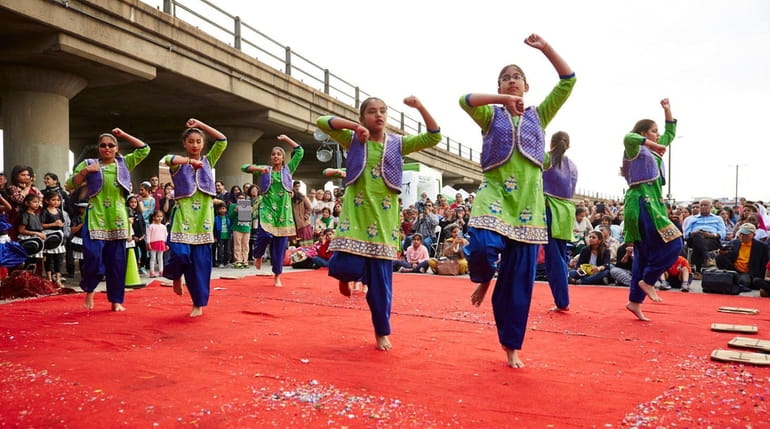 The Aria dance company performs Bollywood dancing during the annual...