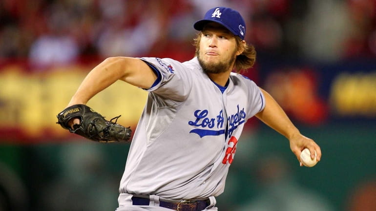 Clayton Kershaw #22 of the Los Angeles Dodgers delivers a...