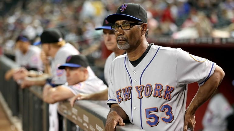 Mets Manager Jerry Manuel looks on from the dugout against...