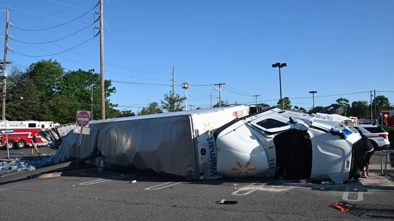 A Walmart tractor trailer at the scene of a muiltivehicle...