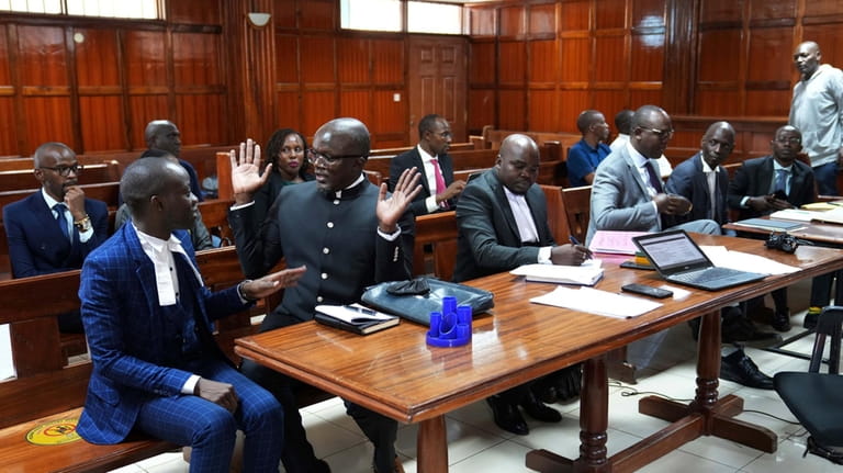 Lawyers react as Justice Chacha Mwita delivers judgement on a...