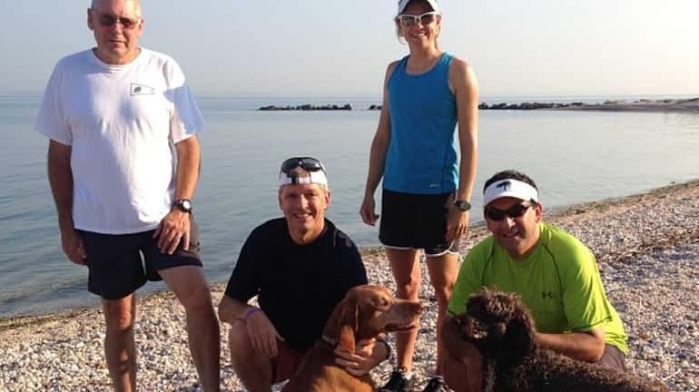 Some Bayville residents, their pooches and an Olympian head on...