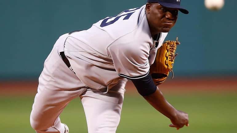 Michael Pineda delivers a pitch during the first inning of...