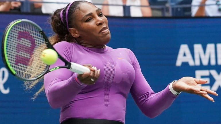 Serena Williams hits a return to Karolina Muchova of the Czech...