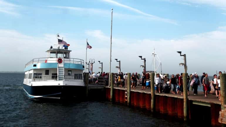 Ferry passengers arrive on Fire Island. (May 22, 2009)