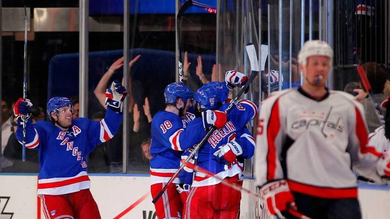 Brad Richards celebrates with his teammates after Michael Del Zotto...