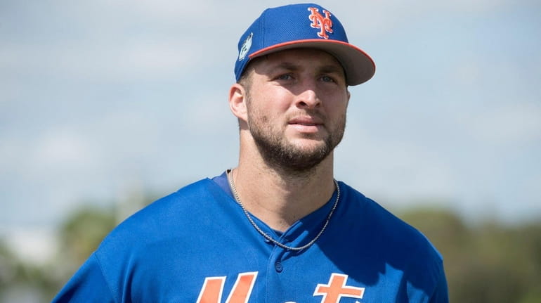 Former NFL quarterback and New York Mets outfielder Tim Tebow...