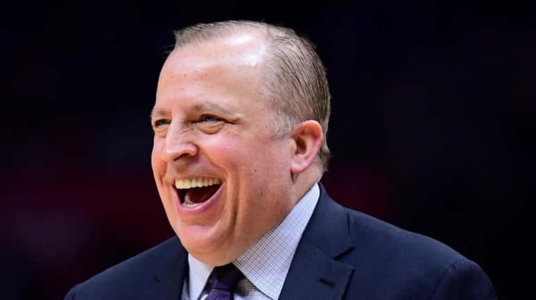 Tom Thibodeau of the Minnesota Timberwolves laughs on the sidelines...