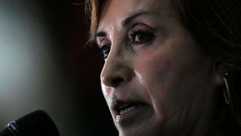 Peru's President Dina Boluarte talks to the press at the...