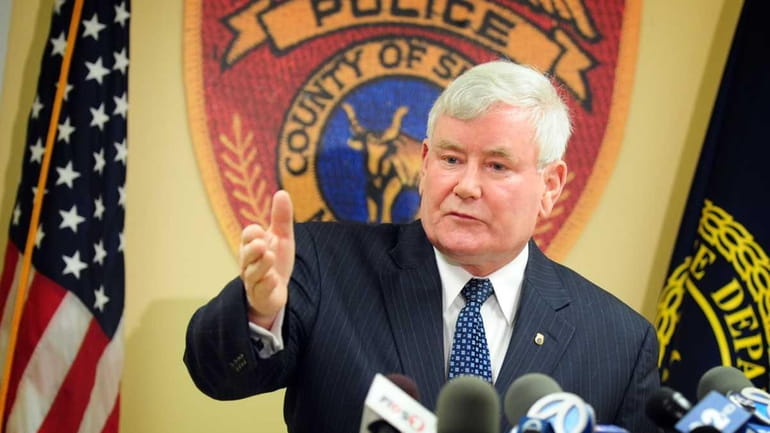 Suffolk County Police Commissioner Richard Dormer speaks to media about...