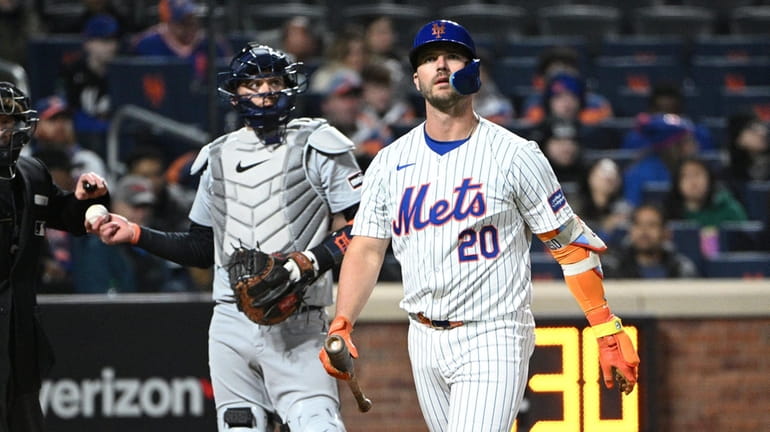 Mets first baseman Pete Alonso looks on after striking out...
